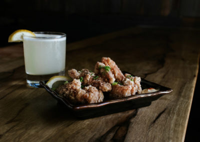 Chicken Wings and a cocktail. Photography by Kara Stokes - Hapa Ramen & Whiskey, Portland, Oregon